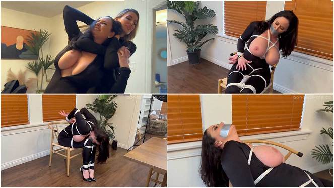 Rival Burglars Cat burglar Christina Carter is tied up